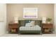 Charming Bedroom with a green crib, wooden nightstands with wicker baskets, and soft lighting at 3454 Howell Dr, Lake Wales, FL 33859