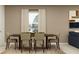 Elegant dining area featuring a wooden table with seating for six and neutral decor at 3454 Howell Dr, Lake Wales, FL 33859