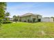 Expansive backyard with privacy fence and lush landscaping at 5446 Highlands Vista Cir, Lakeland, FL 33812