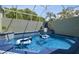 This outdoor pool has a waterfall feature and patterned tile at 5446 Highlands Vista Cir, Lakeland, FL 33812