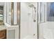 Close-up of the shower featuring a modern shower head and white tiling at 5446 Highlands Vista Cir, Lakeland, FL 33812