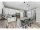 Kitchen featuring granite countertops, pendant lighting, stainless steel appliances, and bar seating at 140 Trinity Ridge Cir, Davenport, FL 33897
