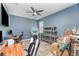 Office space featuring a ceiling fan and natural light at 140 Trinity Ridge Cir, Davenport, FL 33897