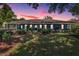 Exterior view of a home with covered porches and front yard at 25601 Hutcheson Ln, Sorrento, FL 32776