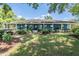 Well maintained home with mature landscaping and covered front porch at 25601 Hutcheson Ln, Sorrento, FL 32776