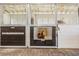 Well-maintained horse stall with a friendly horse looking out, highlighting the equestrian facilities at 25601 Hutcheson Ln, Sorrento, FL 32776