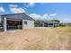 Spacious outbuildings provide ample storage and workspace on this sprawling horse property at 25601 Hutcheson Ln, Sorrento, FL 32776