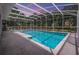 Screened in swimming pool is a relaxing oasis at 25601 Hutcheson Ln, Sorrento, FL 32776