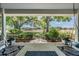 View from the porch featuring the lush grounds and a horse pasture at 25601 Hutcheson Ln, Sorrento, FL 32776