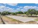 Well maintained horse riding arena featuring beautiful trees and fencing at 25601 Hutcheson Ln, Sorrento, FL 32776