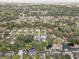 Residential area with mature trees, quiet streets, and diverse housing options at 5811 Lake Breeze Ave, Lakeland, FL 33809