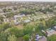 Residential area with mature trees and well-maintained homes at 5811 Lake Breeze Ave, Lakeland, FL 33809