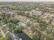 Residential area with mature trees, quiet streets, and diverse housing options at 5811 Lake Breeze Ave, Lakeland, FL 33809