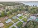 Residential area near a lake featuring mature trees, well-kept lawns and homes at 5811 Lake Breeze Ave, Lakeland, FL 33809