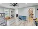Neutral bedroom with light gray wood-look floors, closet, and plenty of room to grow at 5811 Lake Breeze Ave, Lakeland, FL 33809
