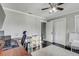 Office with hardwood floors and large closet with lots of lighting, and a wooden desk at 5811 Lake Breeze Ave, Lakeland, FL 33809