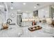 Bright kitchen with marble countertops, stainless appliances, eat-in breakfast bar and stylish decor at 5811 Lake Breeze Ave, Lakeland, FL 33809