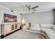 Cozy living room with a large TV, comfortable sofa and contemporary furnishings at 5811 Lake Breeze Ave, Lakeland, FL 33809