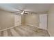 Comfortable bedroom featuring neutral paint, carpeting, a ceiling fan, and closet space for storage at 699 Sullivan St, Deltona, FL 32725