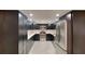 Stylish kitchen featuring dark cabinets, stainless steel appliances, and light countertops at 699 Sullivan St, Deltona, FL 32725