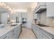 Updated kitchen showcasing stainless steel appliances, a kitchen island, and ample counter space at 1035 Stoney Creek Dr, Lakeland, FL 33811