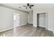 Spacious main bedroom features a ceiling fan, closet, and ensuite bathroom at 133 Grovepark Dr, Davenport, FL 33837
