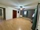 Bedroom with hardwood floors, closet, and natural light at 4621 Queens Point Drive, Lakeland, FL 33813