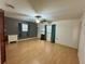 Spacious bedroom with hardwood floors, neutral paint, and ample natural light at 4621 Queens Point Drive, Lakeland, FL 33813