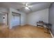 Well-lit bedroom featuring hardwood floors and a closet at 4621 Queens Point Drive, Lakeland, FL 33813