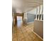Inviting entryway featuring neutral tile flooring and decorative railing leading to the living areas at 4621 Queens Point Drive, Lakeland, FL 33813