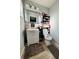 Bathroom featuring a large mirror, a sink with storage, and tiled floors at 4746 Wales St, Lake Wales, FL 33859
