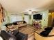 Comfortable living room with wood floors and bright natural light at 4746 Wales St, Lake Wales, FL 33859