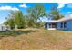 Expansive backyard with ample room for outdoor recreation and gardening opportunities at 12164 Se 85Th Ct, Belleview, FL 34420