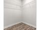 Walk-in closet with laminate flooring and wire shelving at 12164 Se 85Th Ct, Belleview, FL 34420