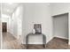 Inviting foyer with hardwood flooring, neutral walls, and decorative console table at 12164 Se 85Th Ct, Belleview, FL 34420