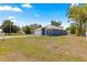 Charming single-story home with a well-maintained lawn and attached two-car garage at 12164 Se 85Th Ct, Belleview, FL 34420