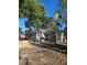 Home exterior with back patio door with backyard under construction at 332 W 8Th St, Lakeland, FL 33805