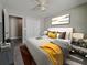Stylish bedroom with a cozy bed, modern decor, and plenty of storage space at 332 W 8Th St, Lakeland, FL 33805