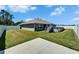 Spacious fenced backyard features a well-maintained lawn and pool with staircase at 5419 Knights Landing Dr, Lakeland, FL 33810