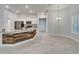 Modern kitchen with granite countertops, white cabinetry and stainless steel appliances at 5419 Knights Landing Dr, Lakeland, FL 33810