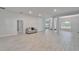 Spacious living area with tile flooring and neutral decor at 5419 Knights Landing Dr, Lakeland, FL 33810