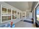 View of the home's covered patio with access to the backyard, featuring plenty of light with its window and door openings at 5419 Knights Landing Dr, Lakeland, FL 33810