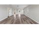 Unfurnished bedroom featuring hardwood flooring, lots of natural light, and neutral wall paint at 634 Canna Dr, Davenport, FL 33897