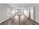 Bright, airy bedroom with hardwood floors and plenty of natural light at 634 Canna Dr, Davenport, FL 33897