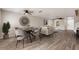 Cozy dining area adjacent to the living room, perfect for entertaining guests at 634 Canna Dr, Davenport, FL 33897