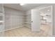 Large pantry with ample shelving and convenient access to kitchen at 634 Canna Dr, Davenport, FL 33897