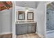 Modern bathroom features double vanity and glass enclosed shower at 130 Stag Ridge Ct, Longwood, FL 32779