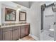 Modern bathroom features double vanity and glass enclosed shower at 130 Stag Ridge Ct, Longwood, FL 32779