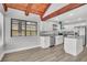 Bright kitchen boasts white cabinetry, stainless steel appliances, and ample counter space at 130 Stag Ridge Ct, Longwood, FL 32779