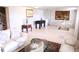 Inviting living room featuring comfortable seating, tiled floors, and tasteful decor at 201 Lake Bonny E Dr, Lakeland, FL 33801